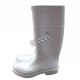 Waterproof white PVC boots with steel toes and anti-slip soles, compliant with ASTM F2413-05 standards.