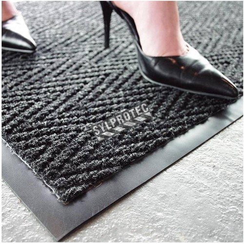 Chevron entrance carpet, 5/16 in made of charcoal gray polypropylene.
