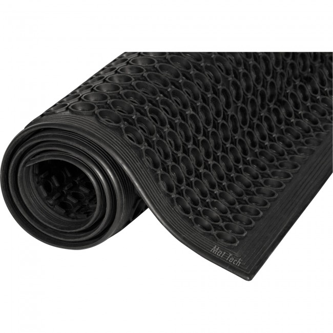 Black carpet 1/2 in. made of vulcanized rubber with cylindrical flow openings and rising grooves.
