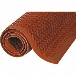 Red carpet 1/2 in, made of vulcanized rubber with cylindrical flow openings and rising grooves.